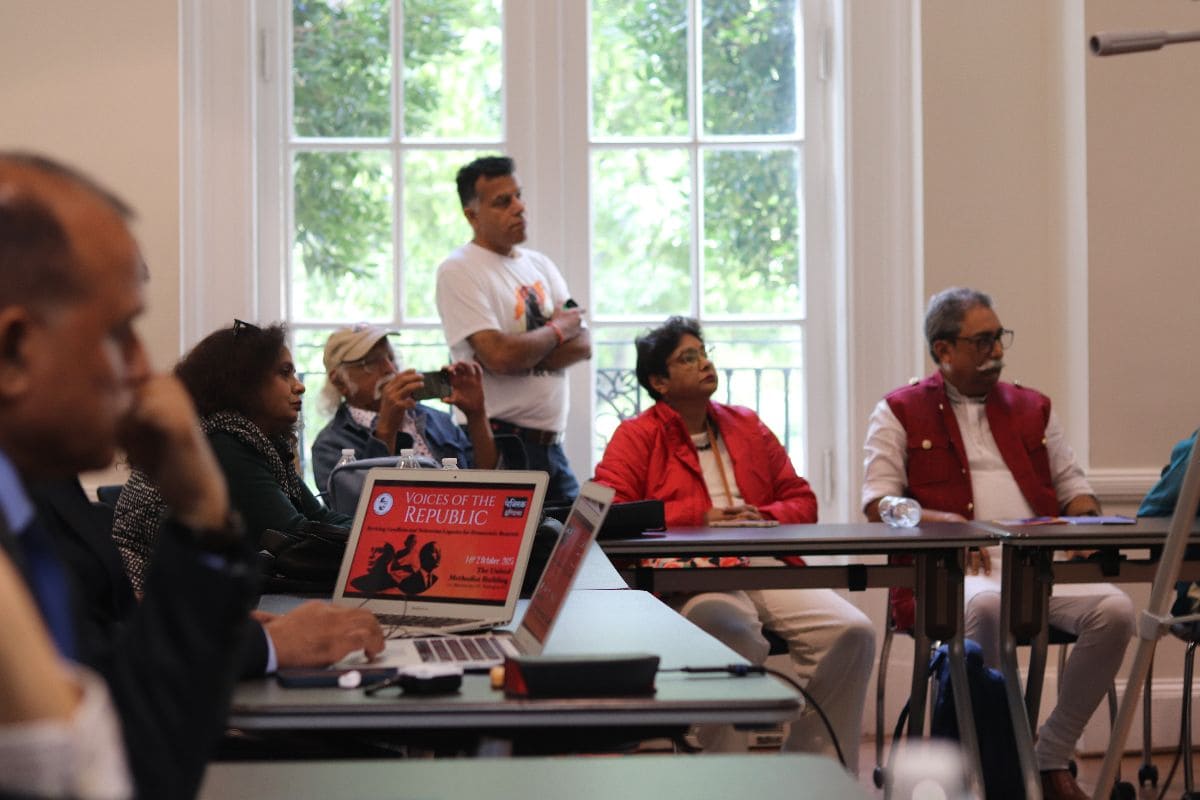 Audience members engaged in discussion