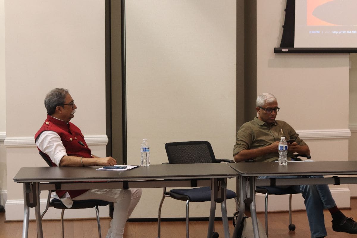 Panellists seated at table
