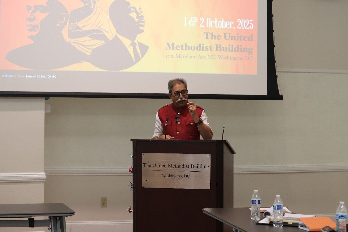 Speaker addressing — podium view with red vest